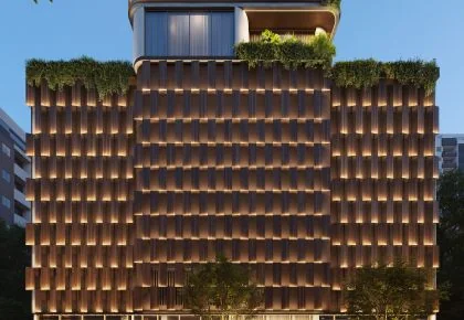 Brises verticais iluminados do embasamento do Baker’s Bay Residence, com jardim na cobertura